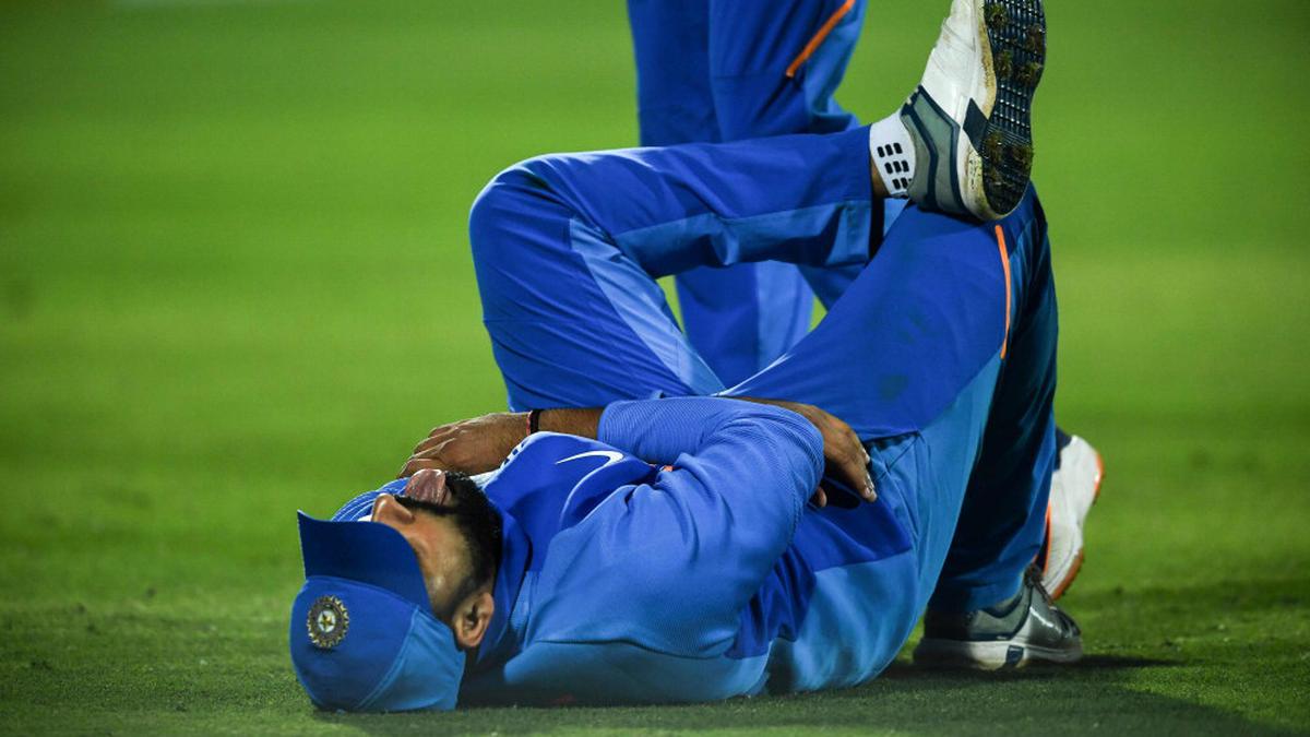 Rohit Sharma Hurts His Left Hand, Taken Off The Field - Sportstar