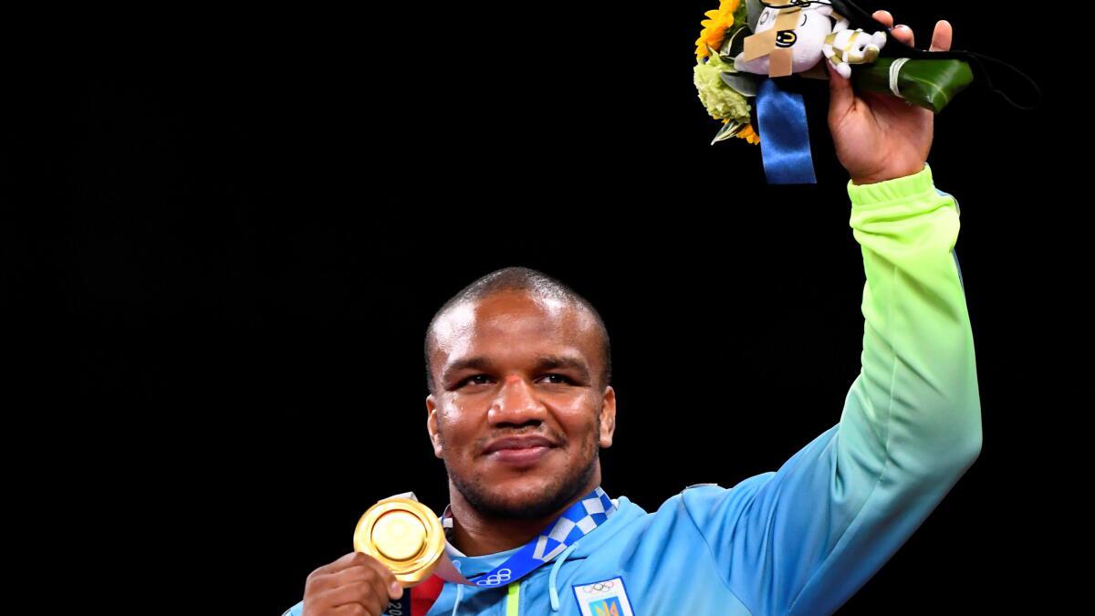 Ukrainian Olympic gold medallist Beleniuk says he was racially abused in the street