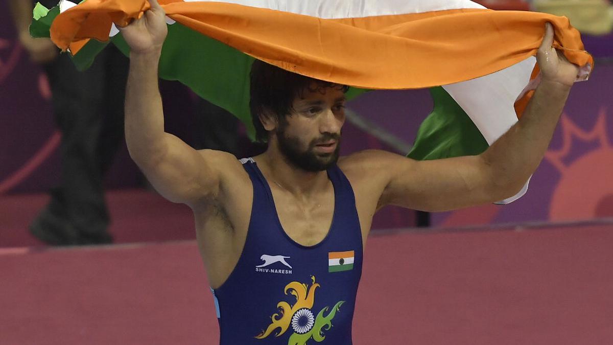 Ravi retains Asian wrestling title, Bajrang settles for silver after withdrawing from final due to injury