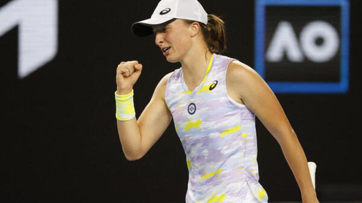 Swiatek rallies to reach maiden Australian Open quarter-final